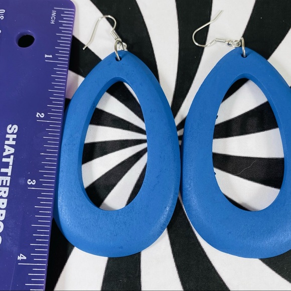 Bright blue teardrop cut out wooden hoop earrings - Picture 2 of 2